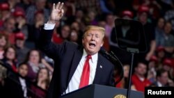 U.S. President Donald Trump speaks during a campaign rally in Grand Rapids, Mich., March 28, 2019.