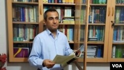 This undated photo shows Iranian Kurdish journalist and civil rights activist Ejlal Ghavami, who posted a tweet Aug. 14, 2018, saying he received a summons to be questioned by prosecutors in the northwestern city of Sanandaj in the next five days.