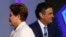 Brazil's presidential candidates Aecio Neves (R) of Brazilian Social Democratic Party (PSDB) and Dilma Rousseff of Workers Party (PT) take part in a TV debate in Rio de Janeiro, Oct. 2, 2014.