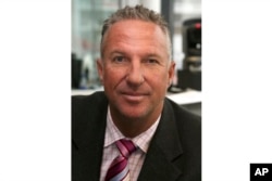 FILE - Former England cricketer Ian Botham in 2007.