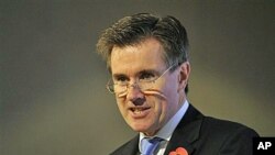Britain's Secret Intelligence Service chief John Sawers addresses a gathering of academics, officials and editors in London, 28 Oct 2010