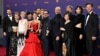 Japanese actor Hiroyuki Sanada (C), alongside cast and crew, winners of Outstanding Drama Series for "Shogun" pose in the press room during the 76th Emmy Awards at the Peacock Theatre at L.A. Live in Los Angeles on Sept. 15, 2024. 