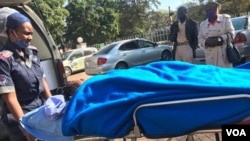 Johanna Mamombe in a stretcher at a private hospital in Harare. (VOA)