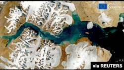 A satellite image shows Ingolf Fjord, Greenland, July 29, 2021. Greenland's ice sheet has experienced a "massive melting event," Danish researchers say.