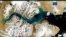 A satellite image shows Ingolf Fjord, Greenland, July 29, 2021. Greenland's ice sheet has experienced a "massive melting event," Danish researchers say.