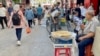 Shoppers in Tunisia's capital. High prices and unemployment have left many struggling.