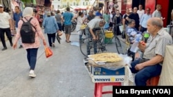 Shoppers in Tunisia's capital. High prices and unemployment have left many struggling.