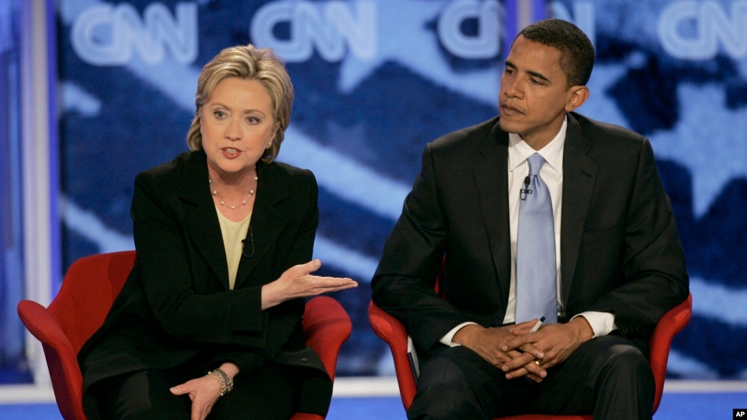 FILE - Then-Sen. Hillary Clinton, D-N.Y., answers a question alongside then-Sen. Barack Obama, D-Ill., during a presidential primary debate in Manchester, N.H., June 3, 2007. Obama formally endorsed Clinton's 2016 White House bid on June 9. 