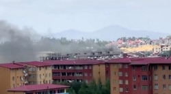 Smoke rises over Addis Ababa during protests following the fatal shooting of the Ethiopian musician Hachalu Hundessa, June 30, 2020, in this screengrab taken from a video.
