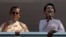 FILE - In this Nov. 9, 2015, photo, Myanmar's pro-democracy icon Aung San Suu Kyi, right, delivers a speech as close ally Tin Oo waves in Yangon, Myanmar. Tin Oo died June 1, 2024, at the age of 97.