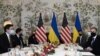 Ukrainian Foreign Minister Dmytro Kuleba, left, meets with United States Secretary of State Antony Blinken, right, in Brussels, Belgium, April 13, 2021.
