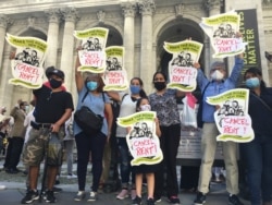 FILE - A March on Billionaire Landlords is seen in New York City in August 2020.