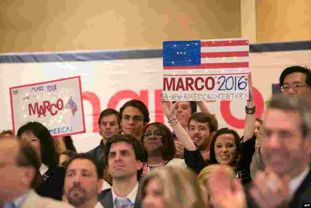 Supporters hold signs for Republican presidential candidate Marco Rubio during a campaign rally at the Intercontinental Buckhead Hotel in Atlanta, Georgia, Feb. 29, 2016.