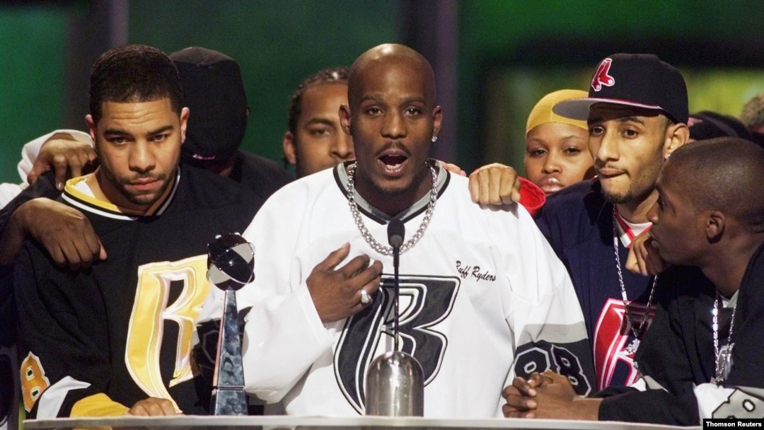 File - Rapper DMX offers a prayer after winning the R&B Albums Artist of the Year award.