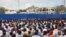 Thousands of Somalis gather to pray at the site of the country's deadliest attack and to mourn the hundreds of victims, at the site of the attack in Mogadishu, Somalia, Oct. 20, 2017.