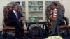 FILE - United States Ambassador to Zimbabwe Brian Nichols, left, is seen during a courtesy call with Zimbabwean President elect Emmerson Mnangagwa at his official residence State House in Harare, Aug, 15, 2018. Nichols emphasized the need to respect human rights.