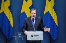 FILE - Sweden's Prime Minister Stefan Lofven speaks during a news conference updating on the coronavirus situation, at the government headquarters in Stockholm, Sweden, Nov. 3, 2020.
