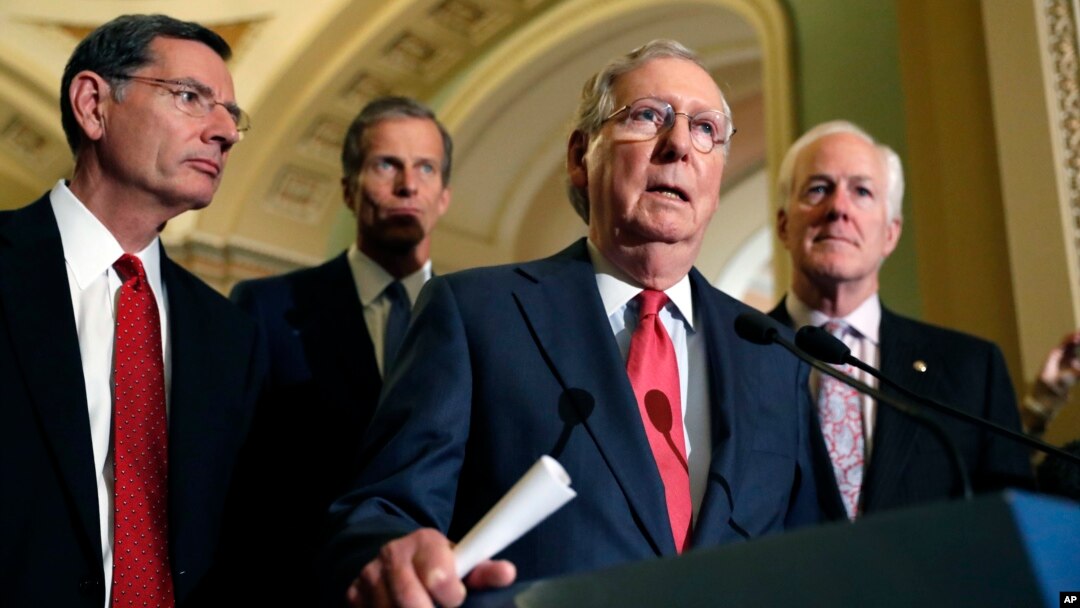 From left, Sen. John Barrasso, R-Wyo., Sen. John Thune, R-S.D., Senate Majority Leader Mitch McConnell of Ky., and Senate Majority Whip John Cornyn of Texas, participate in a news conference on Capitol Hill in Washington, Nov. 16, 2016.