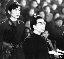 FILE - Jiang Qing, widow of Chairman Mao Tse-tung, appears before a session of the special tribunal of the Supreme People's Court in Beijing on Dec. 5, 1980. Jiang claimed she was being scapegoated for implementing Mao's directives that resulted in the persecution of millions.