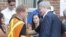Canadian Prime Minister Stephen Harper greets families following a press conference at Lac-Mégantic high school on July 7, 2013 in Lac-Megantic, Quebec, Canada, one day after a train derailment and subsequent explosion and fire.