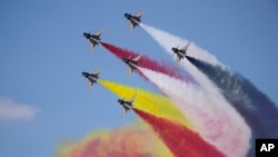 Chinese J-10 fighter jets perform during the Egypt International Airshow at El Alamein International Airport, Sept. 4, 2024.