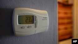 FILE - A thermostat in a house in Plumstead, London, Sept. 8, 2022. 