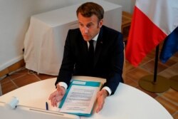 French President Emmanuel Macron speaks during a video-conference on the situation in Lebanon from Fort de Bregançon, southern France, Aug. 9, 2020.