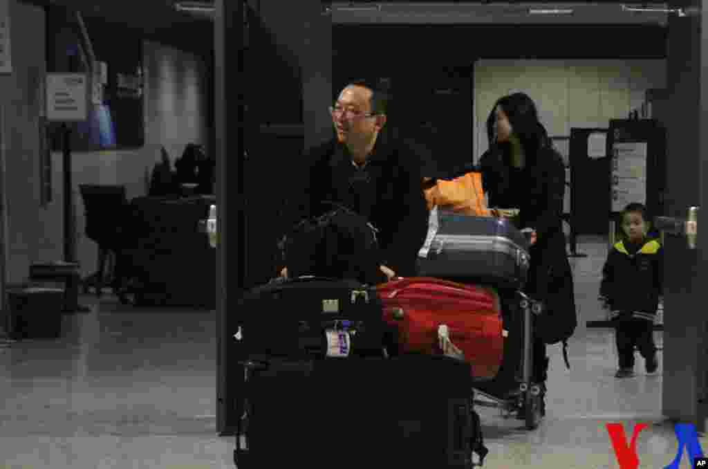 余杰一家顺利抵达华盛顿杜勒斯机场