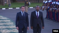 Ethiopia's Prime Minister Abiy Ahmed welcomes French President Emmanuel Macron, Dec. 21, 2024.