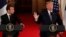 French President Emmanuel Macron listens to U.S. President Donald Trump speak during their joint news conference at the White House in Washington, April 24, 2018.