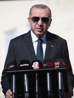 Turkey's President Recep Tayyip Erdogan speaks to the media, in Istanbul, Oct. 23, 2020. Erdogan confirmed the country tested its Russian-made missile defense system, despite objections from the United States.