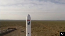 FILE - In this image taken from video, an Iranian rocket carrying a satellite is launched from an undisclosed site, believed to be in Iran's Semnan province, April 22, 2020. 