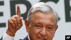 Mexican President Andrés Manuel López Obrador gives his first year's state of the nation address at the National Palace in Mexico City, Sept. 1, 2019. 