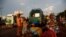 People are pictured at a mini bus station in Bamako, Mali. July 24, 2018.