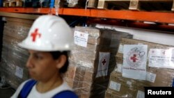 En febrero, la Cruz Roja Internacional firmó un acuerdo de cooperación con el gobierno en disputa de Venezuela, para "mejorar las actividades humanitarias en el país".