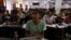 Students attend a class at Super Climax Academy, a coaching institute training students to prepare for competitive examinations to secure government jobs, in Prayagraj, India, June 21, 2024.