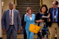 House Speaker Nancy Pelosi of Calif. arrives for a House Democratic caucus meeting on Capitol Hill in Washington, July 10, 2019.