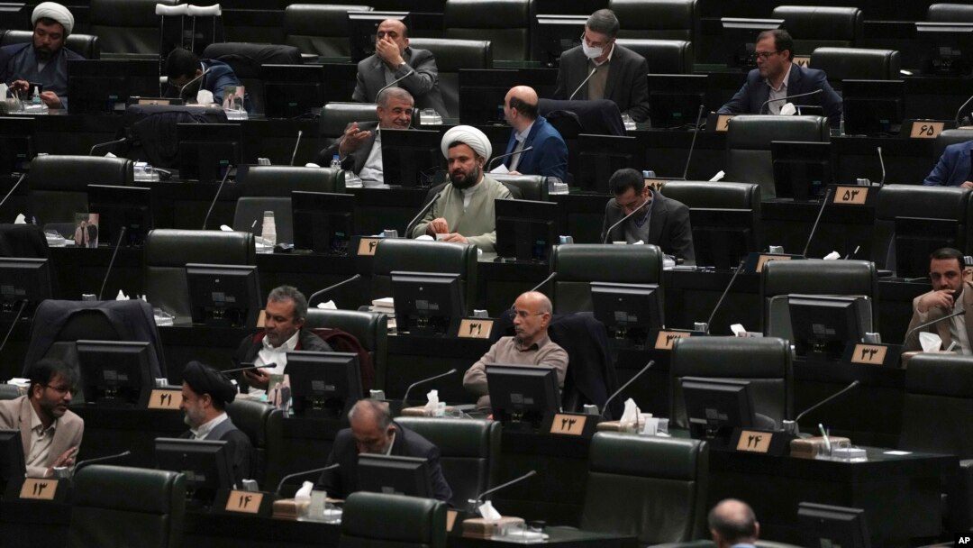 Iranian lawmakers attend an open session of the parliament in Tehran, Iran, Jan. 22, 2023. 