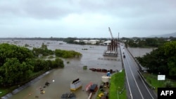 A handout photo taken on Feb. 2, 2025 and released by the Queensland Fire Department on Feb. 3, 2025 shows an aerial view of flood-affected areas around Townsville, Queensland.