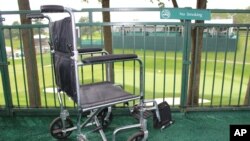 FILE - A wheelchair is seen at a golf course, June 19, 2017. A filmmaker, a political campaigner and a public health expert — all women with disabilities — were named the first winners of the Her Ability awards.