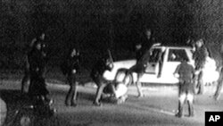 This video image shows police officers beating a black driver named Rodney King. The 1991 event helped start one of the worst race riots in American history.