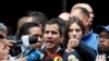 Pemimpin oposisi Venezuela yang mendeklarasikan diri sendiri sebagai presiden sementara negara itu, Juan Guaido di Caracas, Venezuela (27/1).