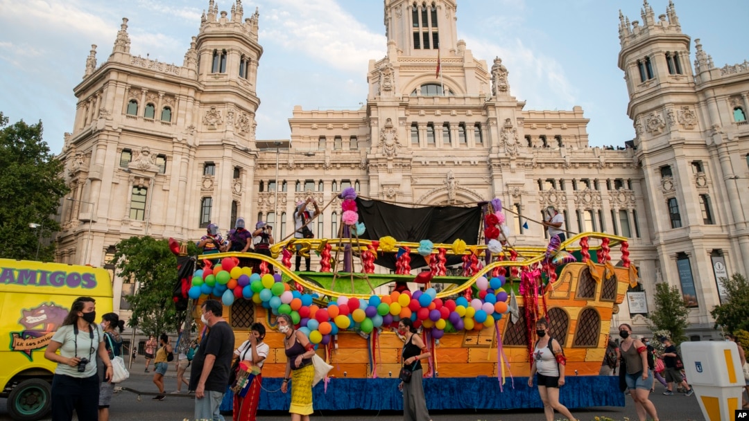 FILE - Mexican Zapatistas move on a top of a boat in front of the city hall in Madrid, Spain, Aug. 13, 2021, marking for the 500th anniversary of the Spanish conquest of Mexico.