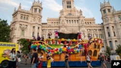 FILE - Mexican Zapatistas move on a top of a boat in front of the city hall in Madrid, Spain, Aug. 13, 2021, marking for the 500th anniversary of the Spanish conquest of Mexico.