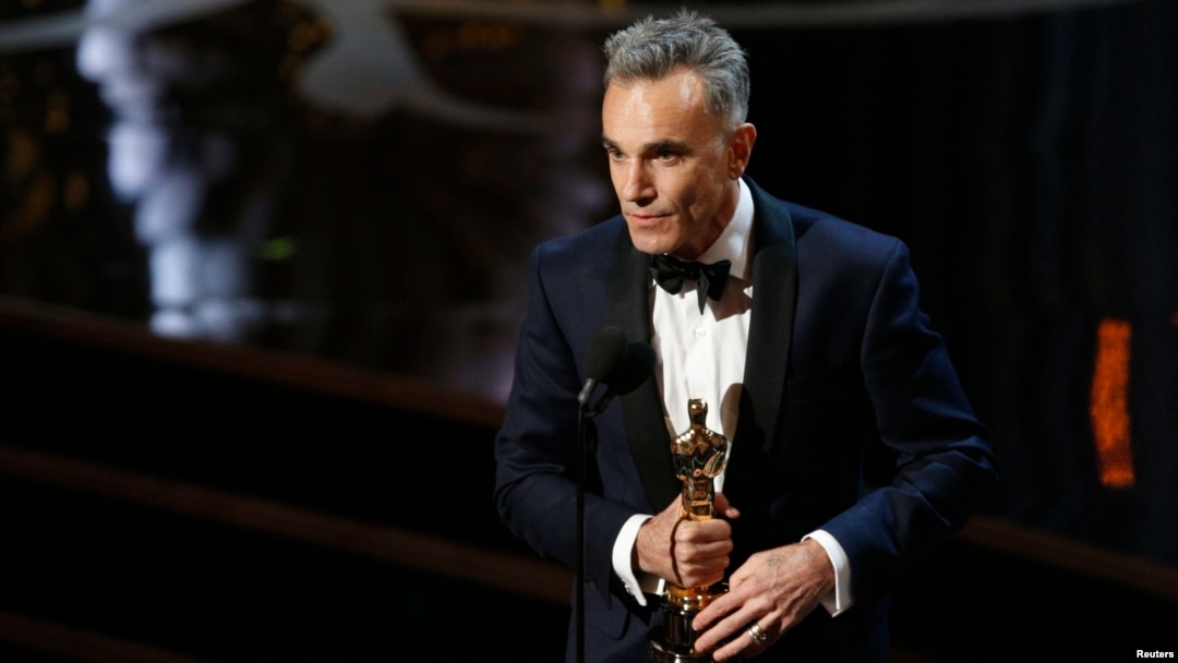 FILE - Daniel Day Lewis accepts the Oscar for best actor for his role in "Lincoln," at the 85th Academy Awards in Hollywood, California, Feb. 24, 2013.