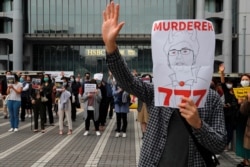 Anti-government protesters take part at a lunchtime protest outside HSBC headquarters in Hong Kong, China, Jan. 2, 2020.