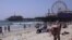 Santa Monica Pier is 25 km from downtown Los Angeles. It is a place frequented by locals and tourists alike. (E. Lee/VOA)