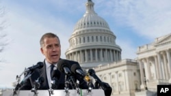 Hunter Biden, son of U.S. President Joe Biden, talks to reporters in Washington on Dec. 13, 2023. Hunter Biden lashed out at Republican lawmakers who have been digging into his business dealings, insisting he will testify only before a congressional committee in public.