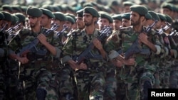 FILE - Members of Iran's Revolutionary Guards march during a military parade to commemorate the 1980-88 Iran-Iraq war in Tehran, Sept. 22, 2007.