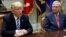 Senate Republican Majority Leader Mitch McConnell, right, listens as President Donald Trump speaks during a meeting with Congressional leaders and administration officials, in the Roosevelt Room of the White House, in Washington, Sept. 5, 2017. 